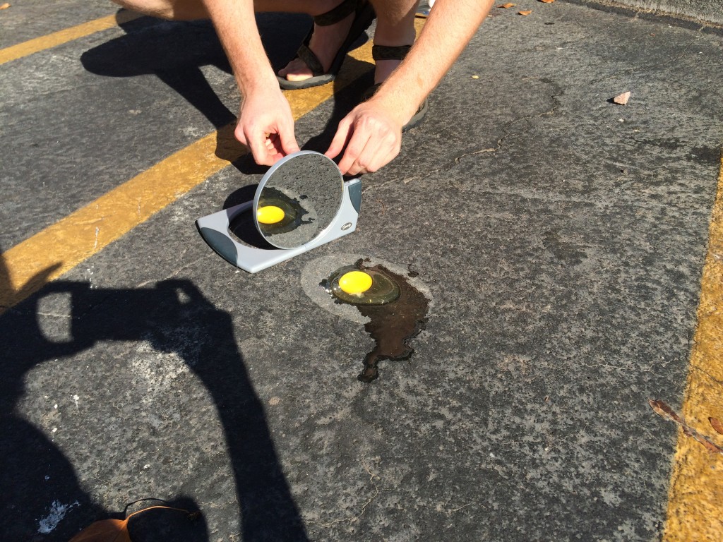 Using a mirror to help cook an egg