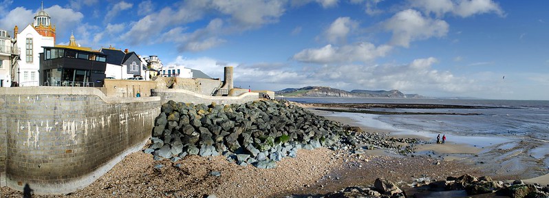 Lyme Regis by Alison Day -- a city with a rocky shore and a hint of the ocean.