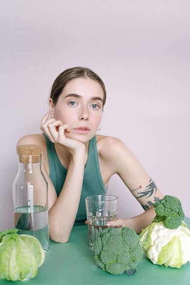 Picture of a woman experiencing emotions while accompanied by cabbage and cauliflower (and broccoli). Washington Allston would approve. Photo by Ivan Samkov from Pexels